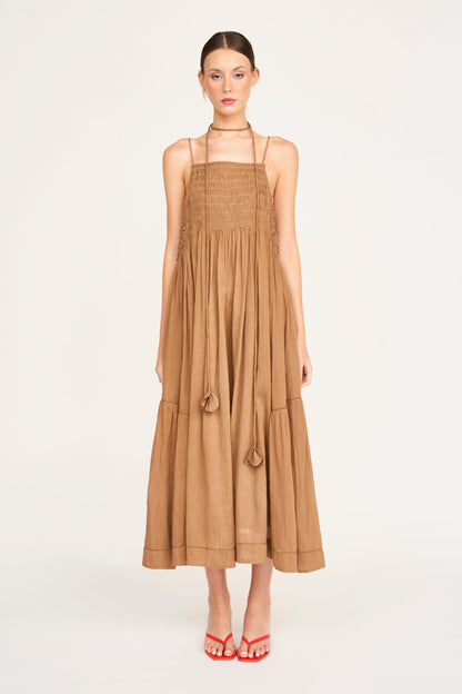 Brown cotton maxi dress on a hanger in store