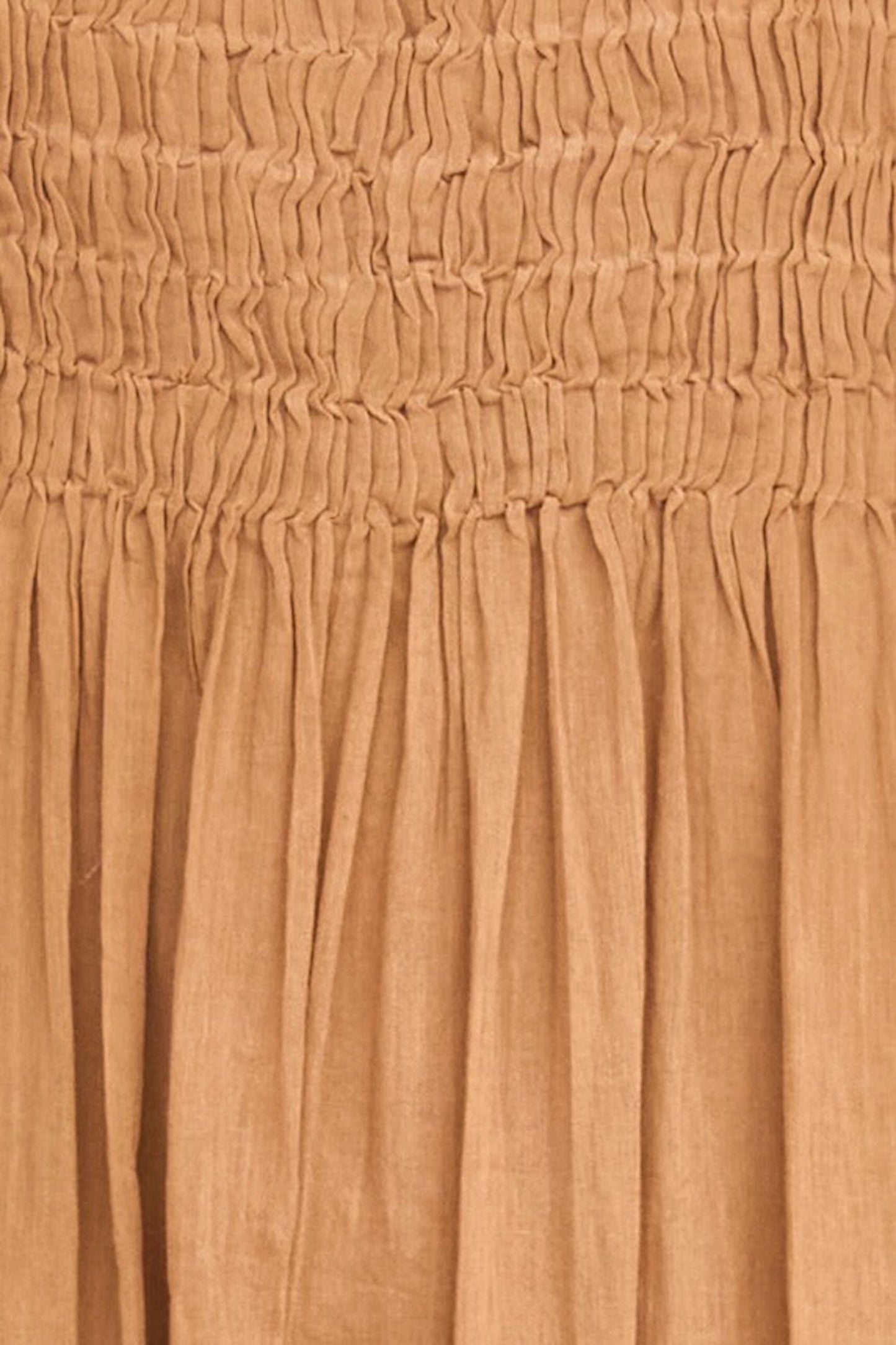 Brown cotton maxi dress on a hanger in store
