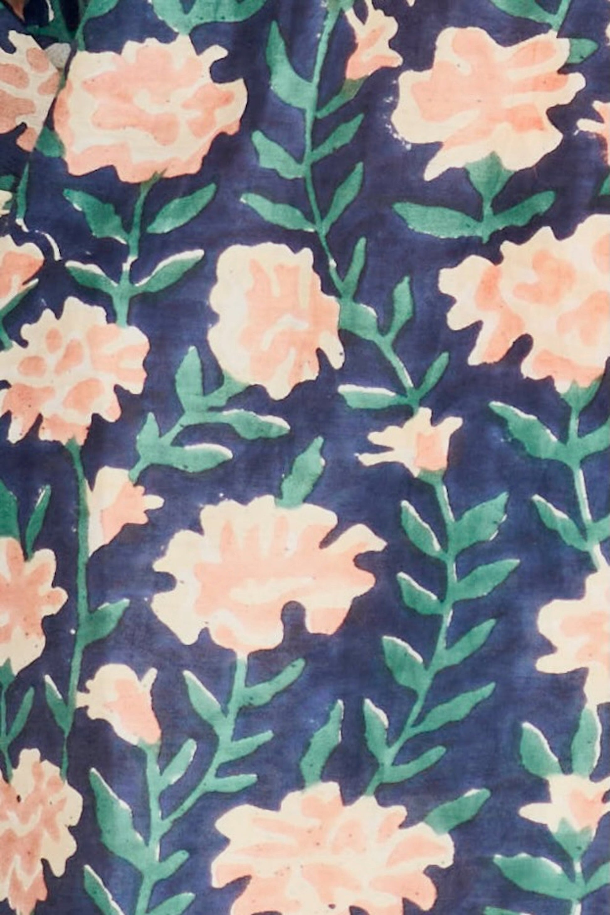 Pink cotton short dress on a hanger in store