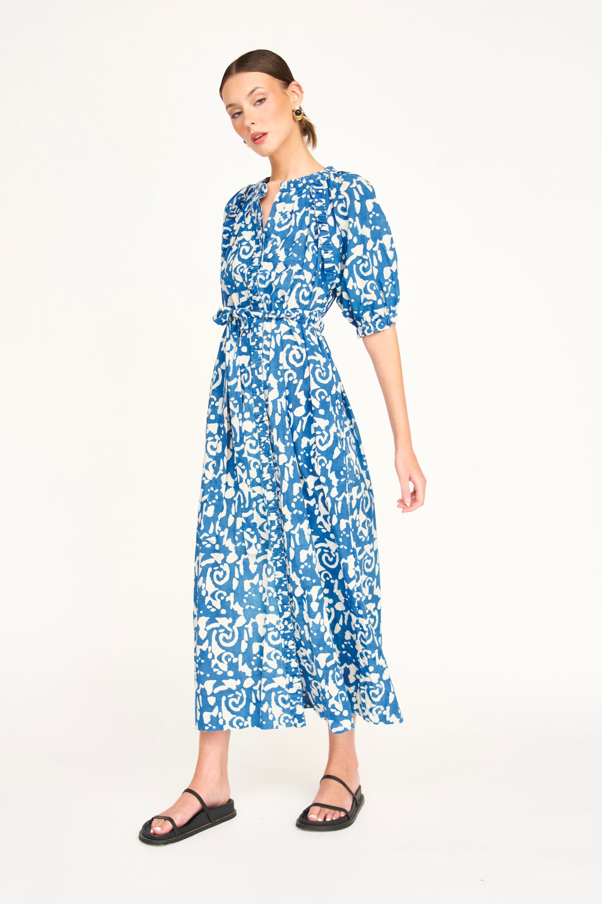 Indigo cotton maxi dress on a hanger in store