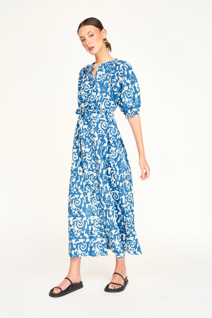 Indigo cotton maxi dress on a hanger in store