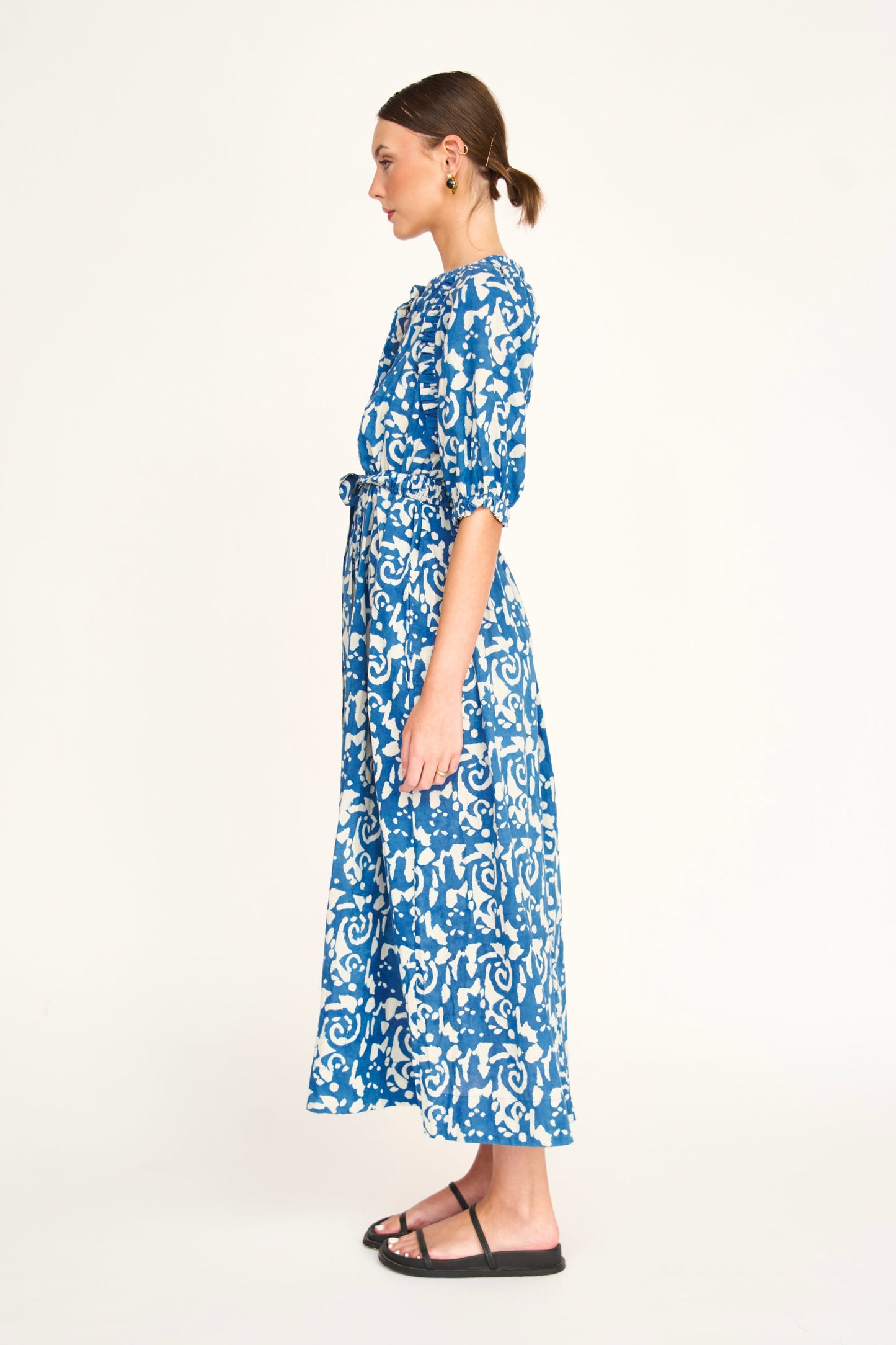 Indigo cotton maxi dress on a hanger in store