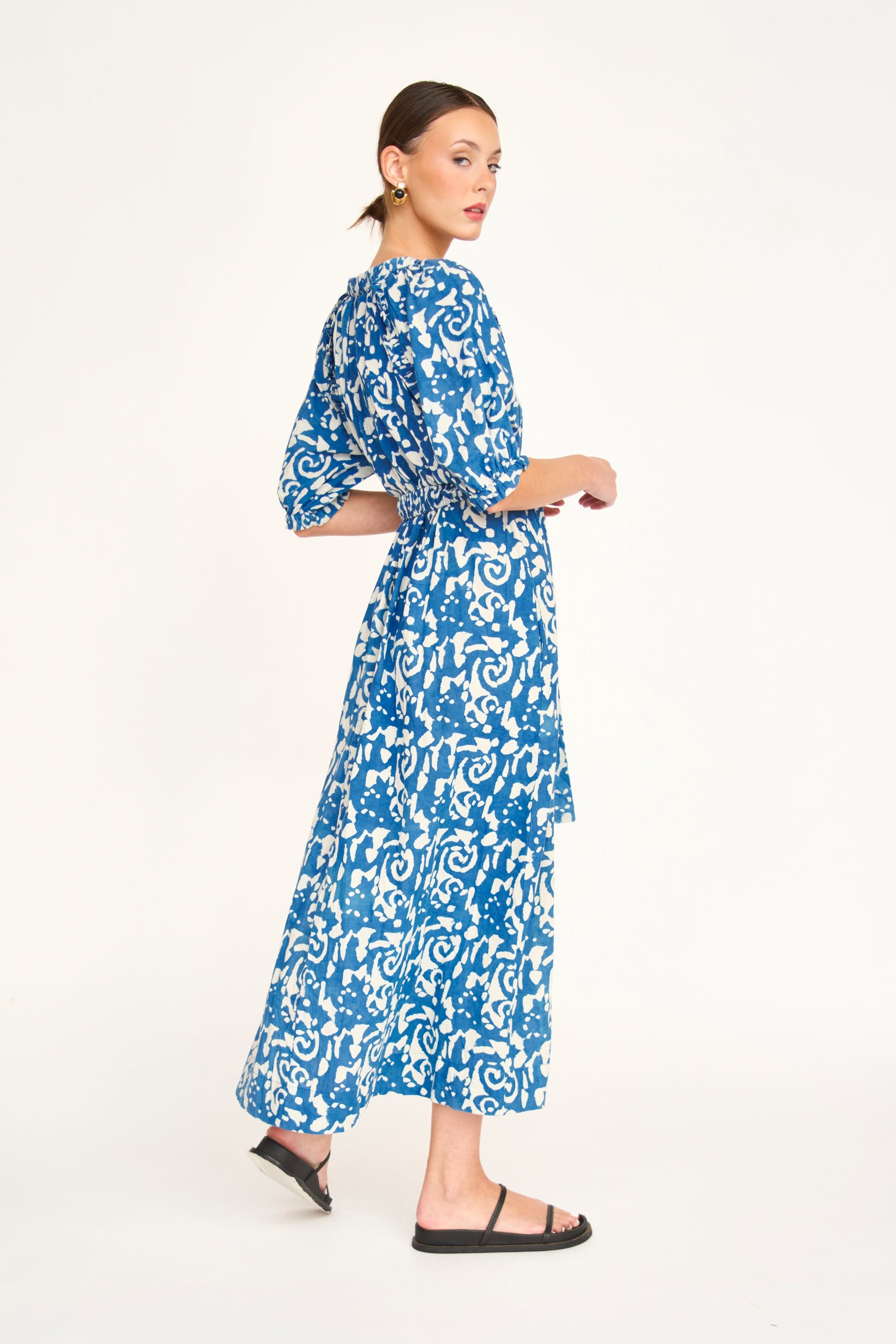 Indigo cotton maxi dress on a hanger in store