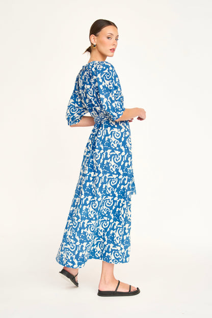 Indigo cotton maxi dress on a hanger in store