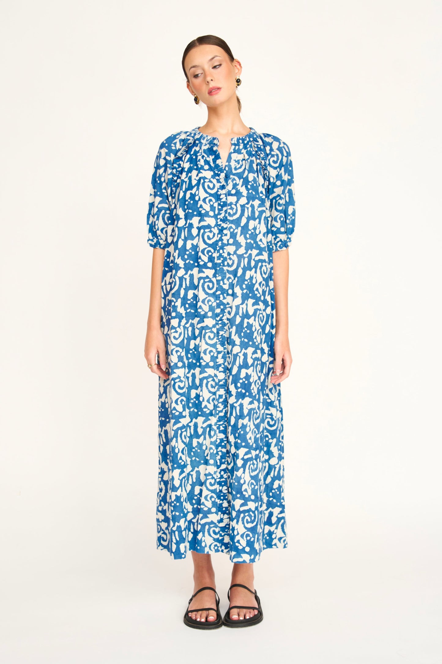 Indigo cotton maxi dress on a hanger in store