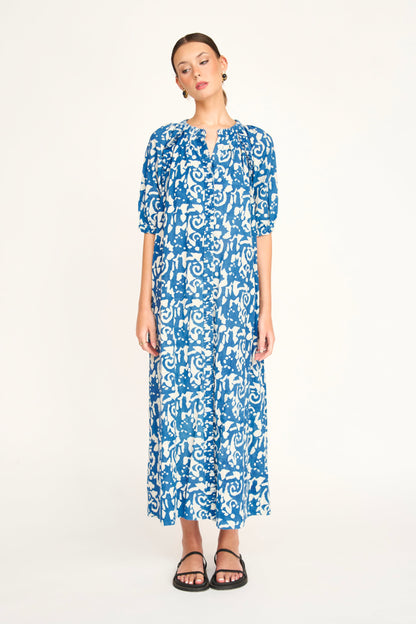 Indigo cotton maxi dress on a hanger in store