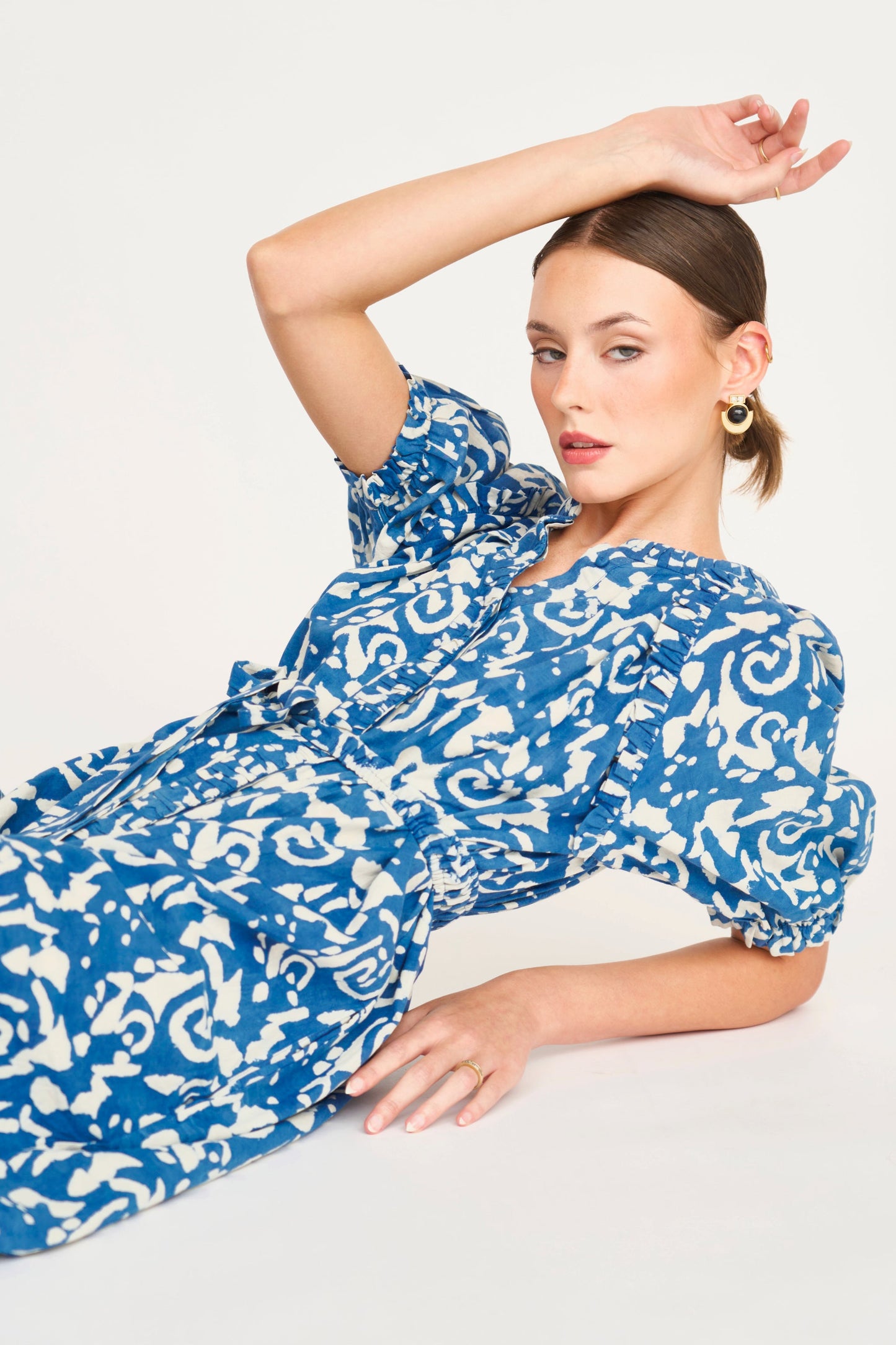 Indigo cotton maxi dress on a hanger in store