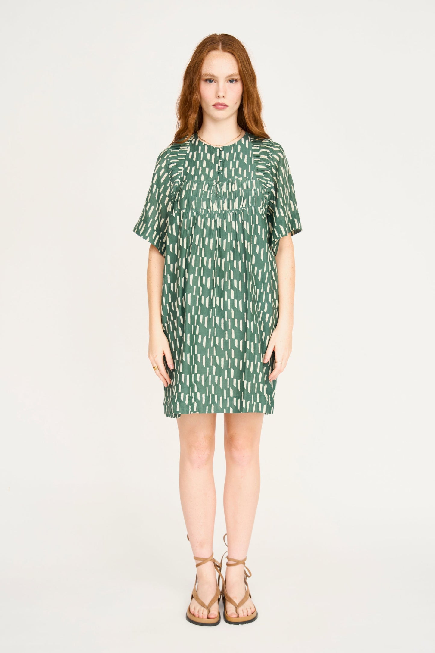 Cotton short dress on a hanger in store
