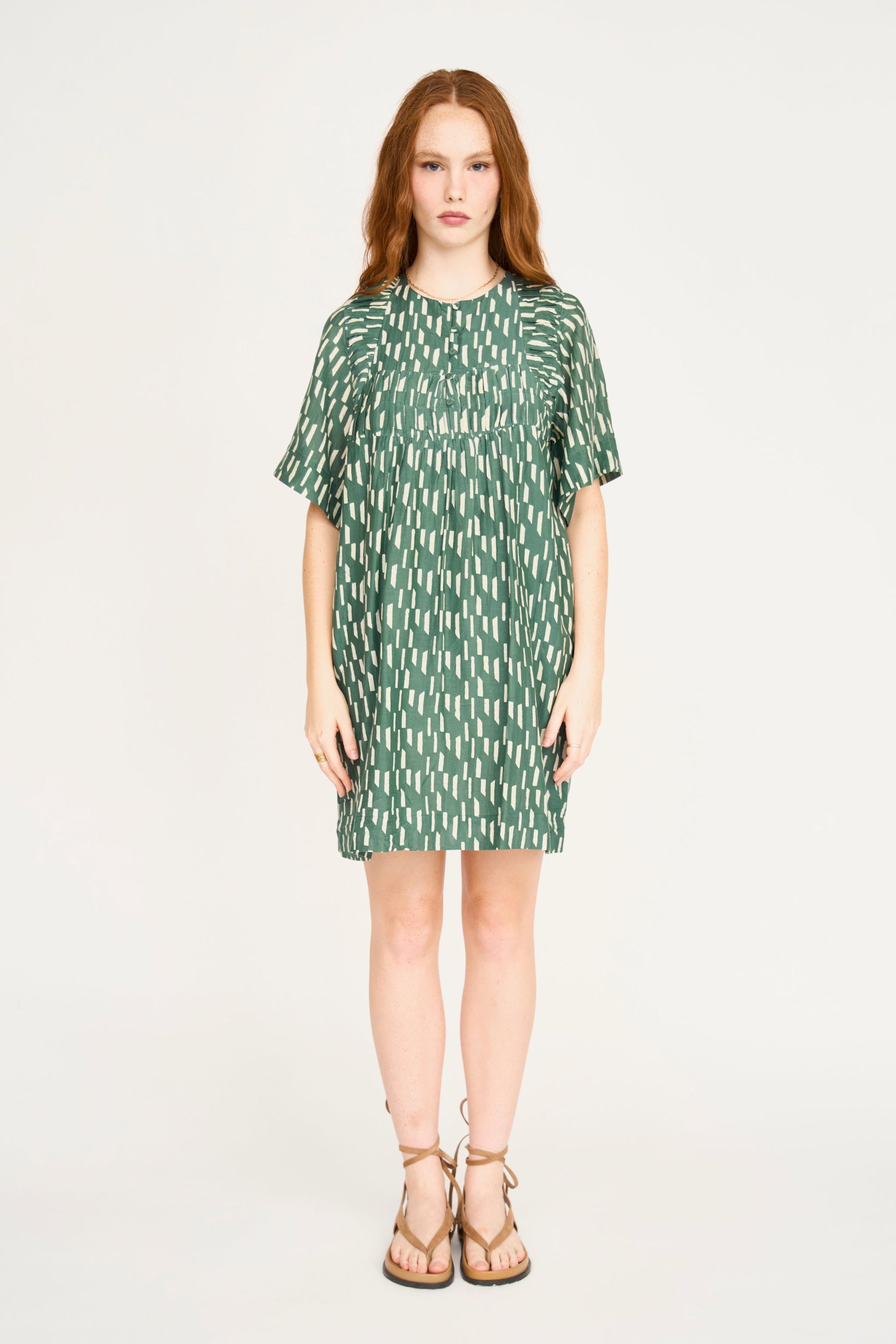 Cotton short dress on a hanger in store