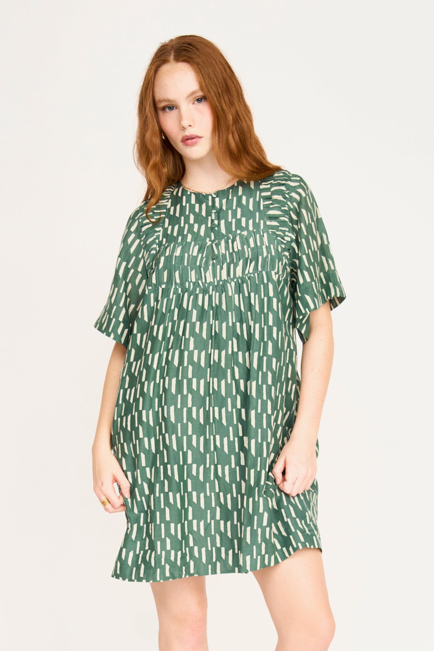 Cotton short dress on a hanger in store
