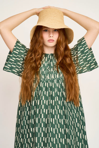 Cotton short dress on a hanger in store