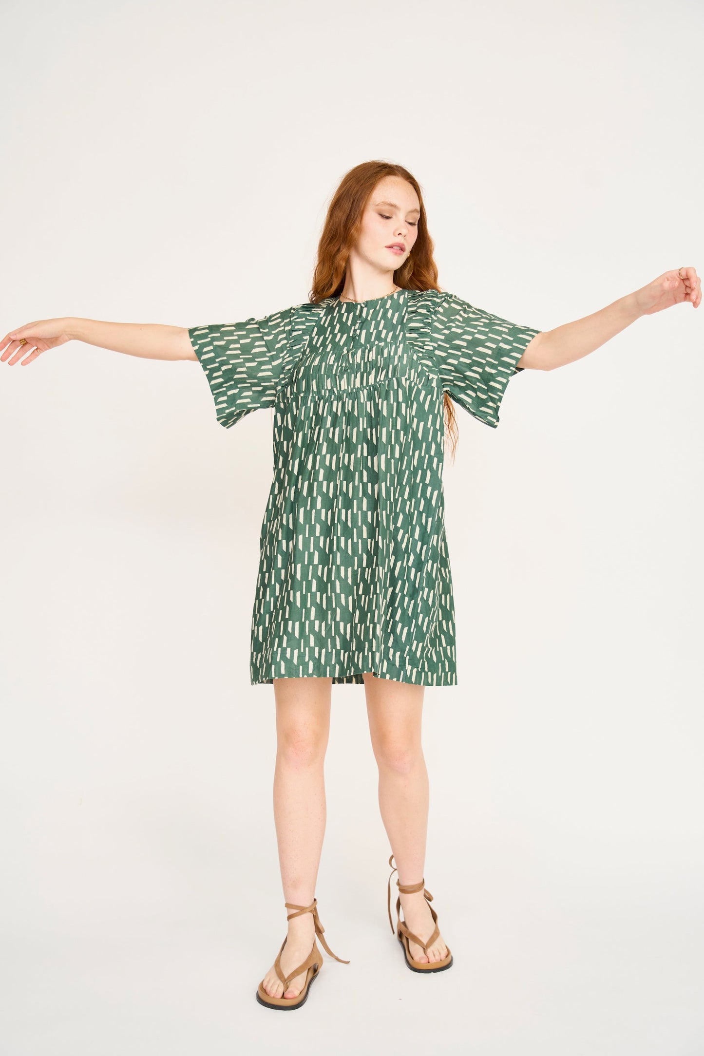 Cotton short dress on a hanger in store
