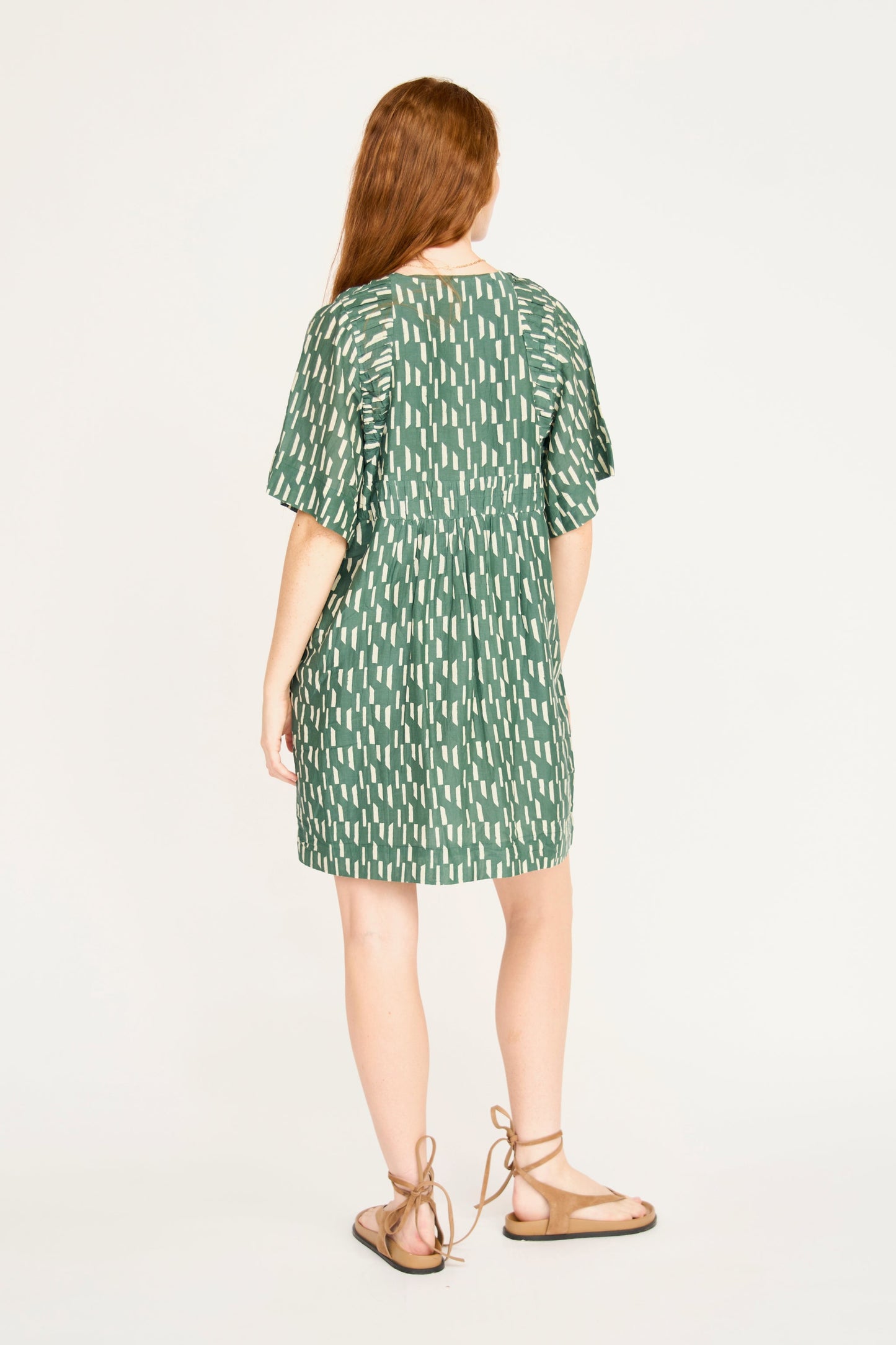 Cotton short dress on a hanger in store