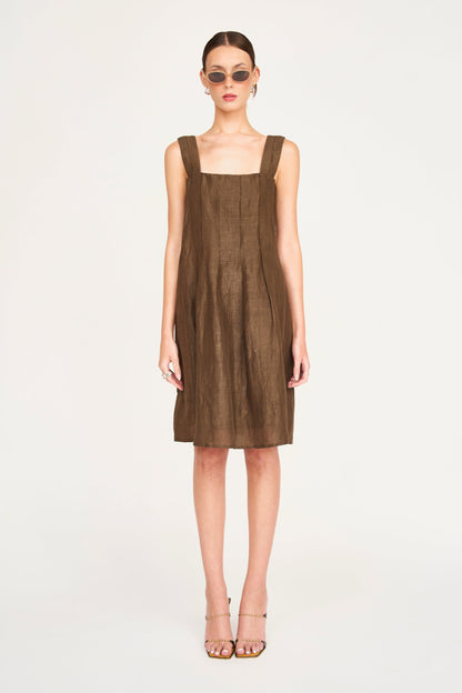 Brown linen short dress on a hanger in store