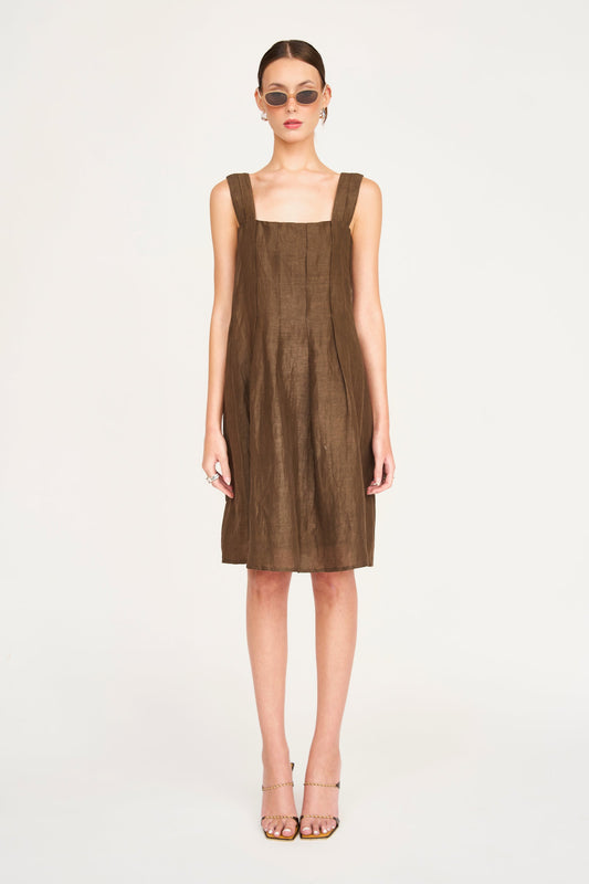 Brown linen short dress on a hanger in store