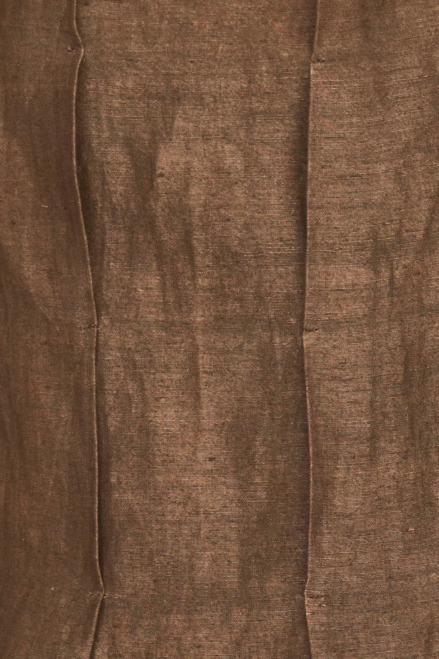 Brown linen short dress on a hanger in store