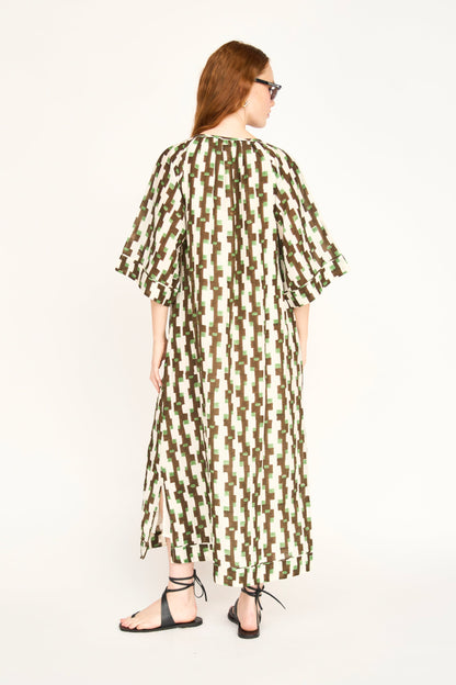 Brown cotton maxi dress on a hanger in store
