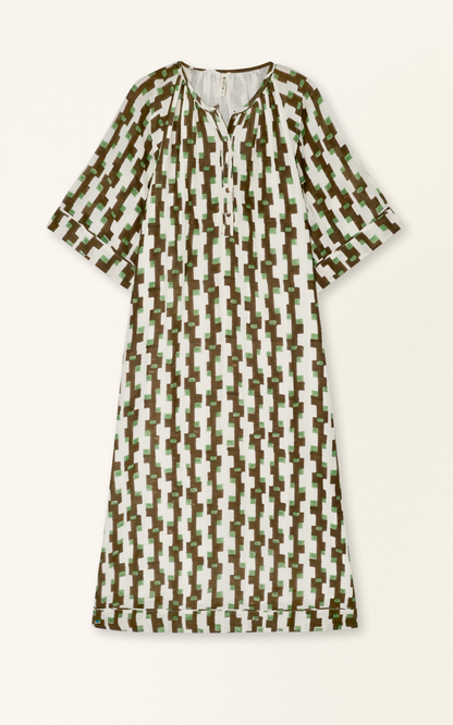 Brown cotton maxi dress on a hanger in store