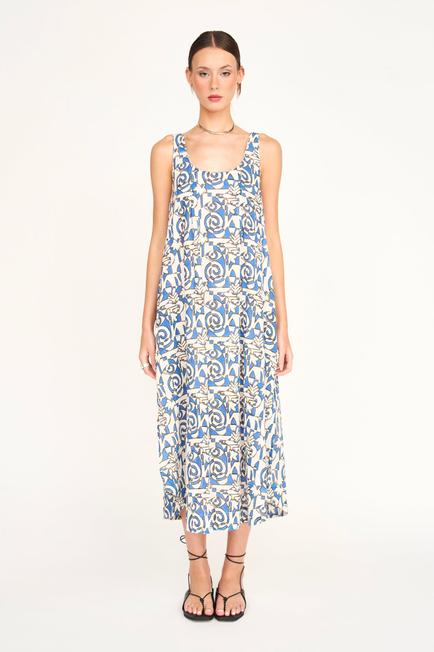 Blue cotton dress on a hanger in store