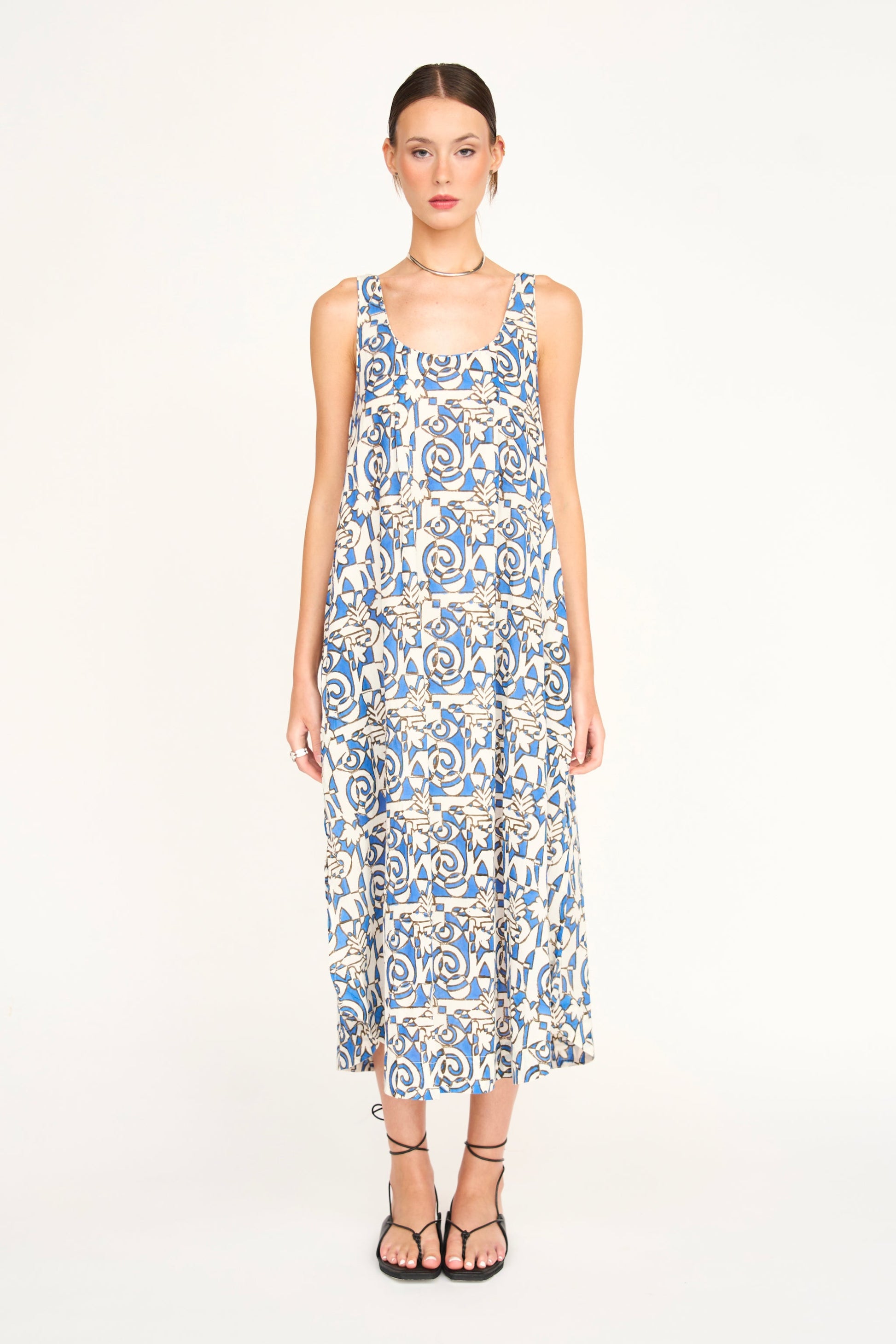 Blue cotton dress on a hanger in store