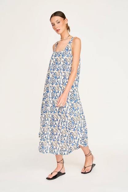 Blue cotton dress on a hanger in store