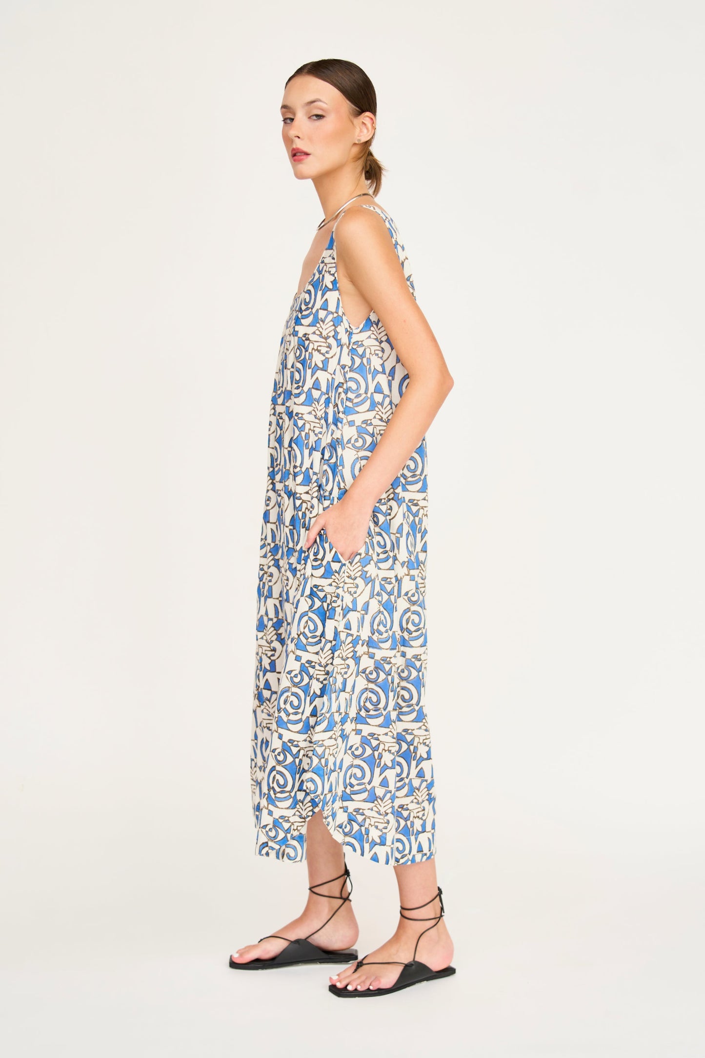 Blue cotton dress on a hanger in store