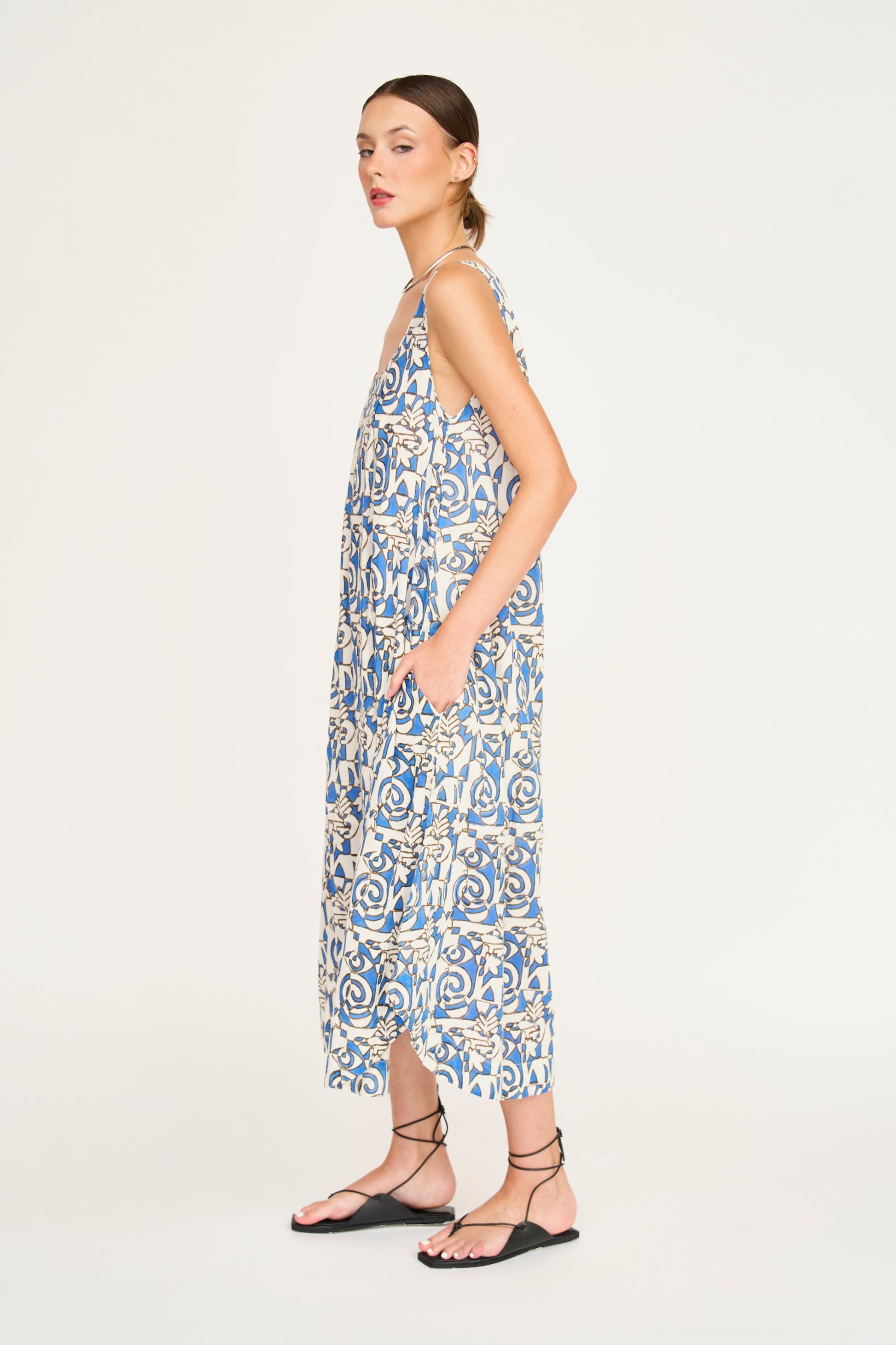 Blue cotton dress on a hanger in store