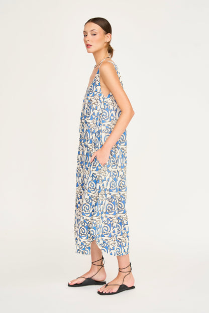 Blue cotton dress on a hanger in store