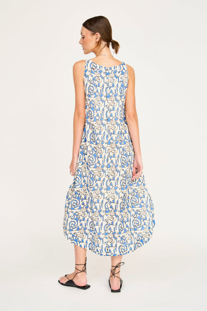 Blue cotton dress on a hanger in store