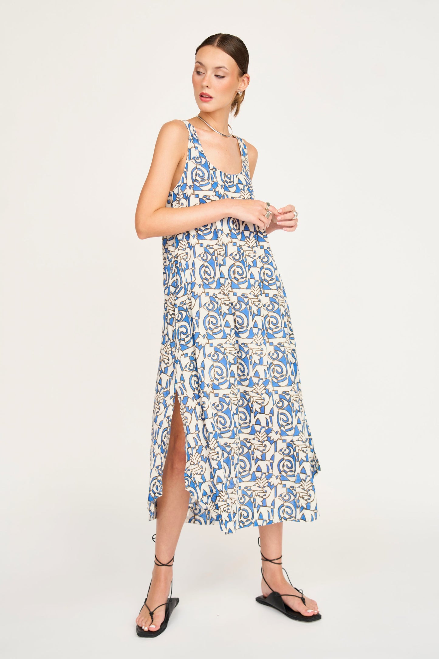 Blue cotton dress on a hanger in store