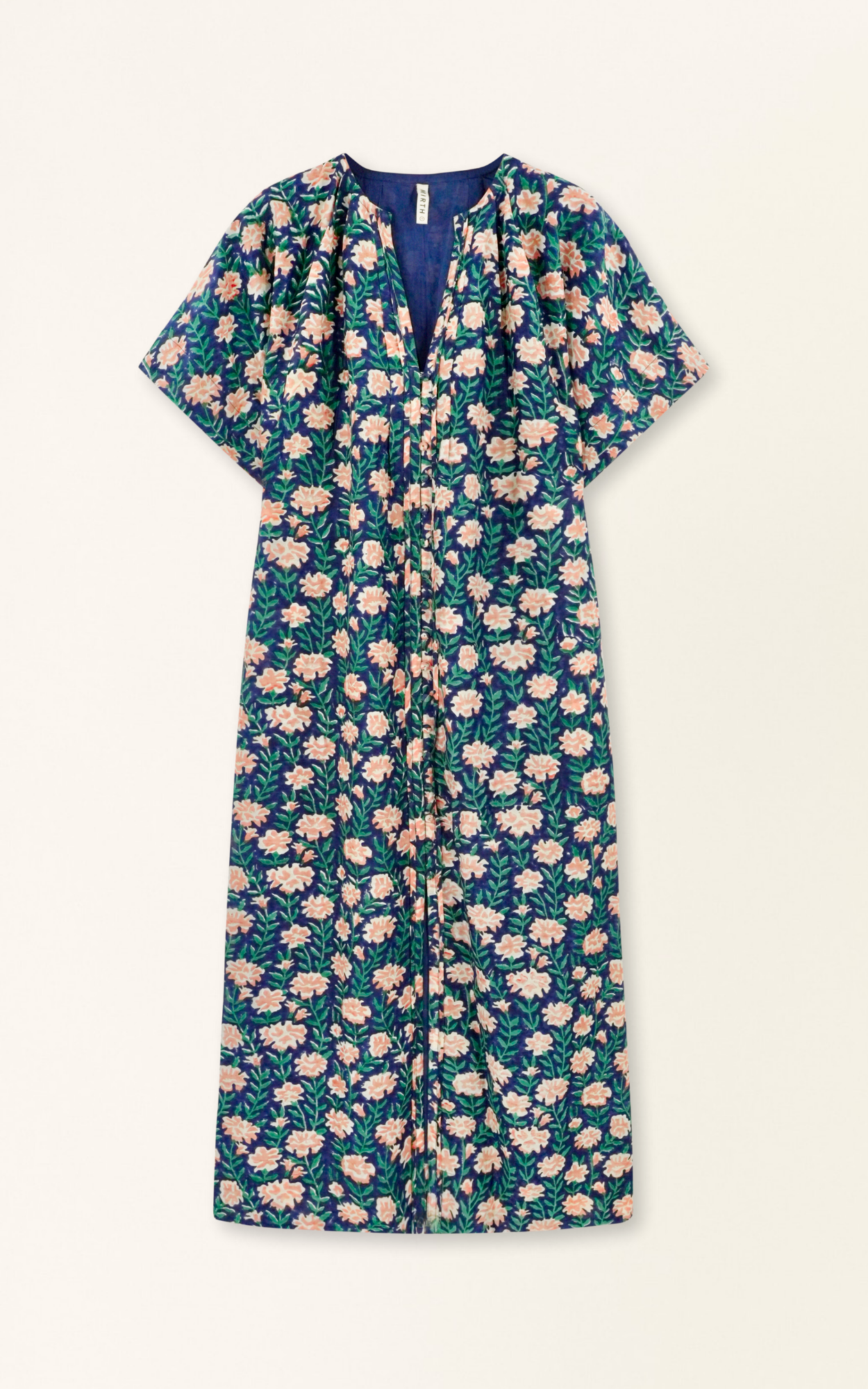 Pink cotton maxi dress on a hanger in store