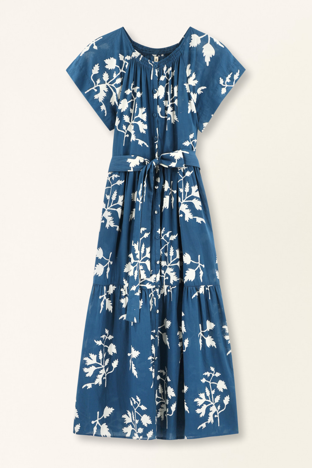 Blue cotton maxi dress on a hanger in store