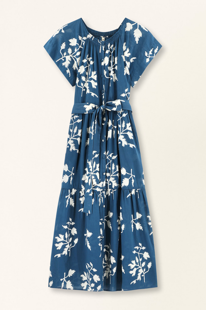 Blue cotton maxi dress on a hanger in store