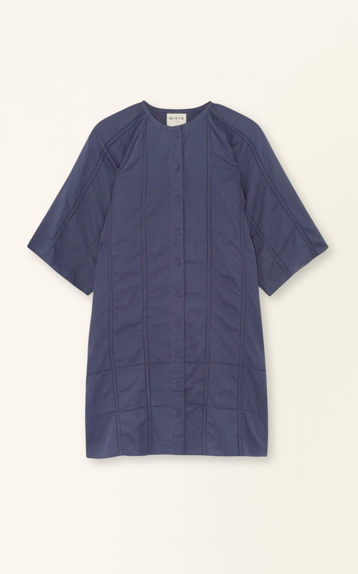 Blue cotton short dress on a hanger in store