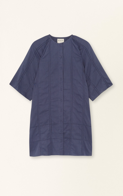 Blue cotton short dress on a hanger in store