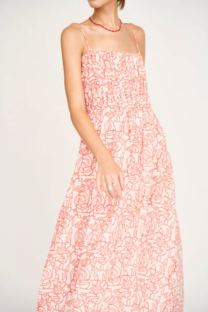 Red cotton midi dress on a hanger in store