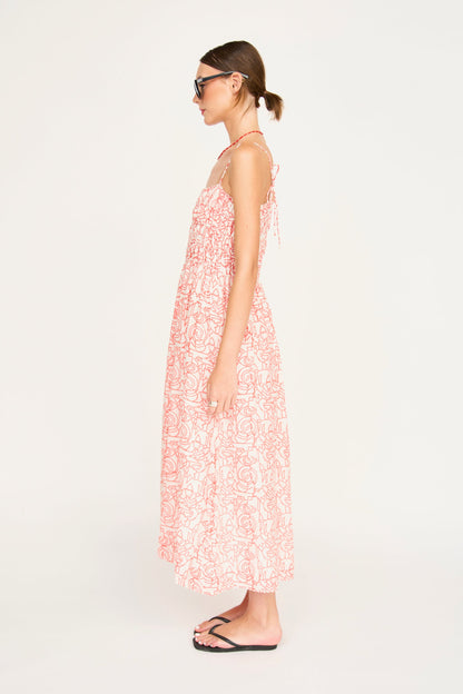 Red cotton midi dress on a hanger in store