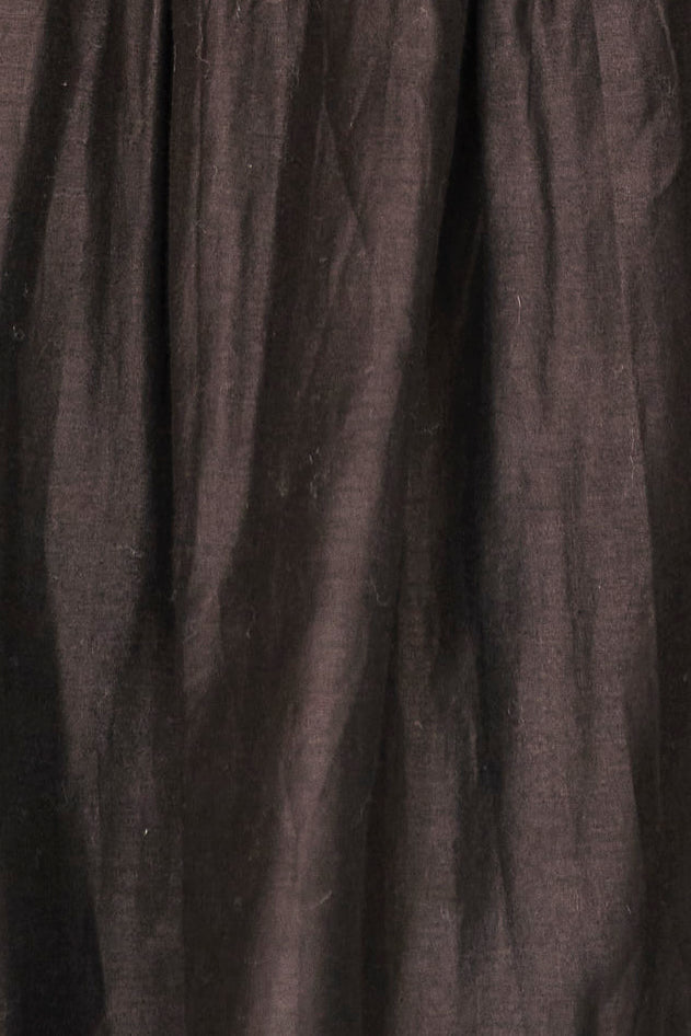Black cotton maxi dress on a hanger in store