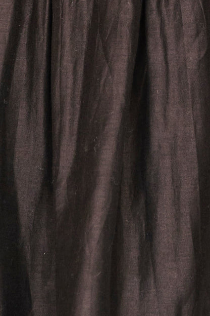 Black cotton maxi dress on a hanger in store