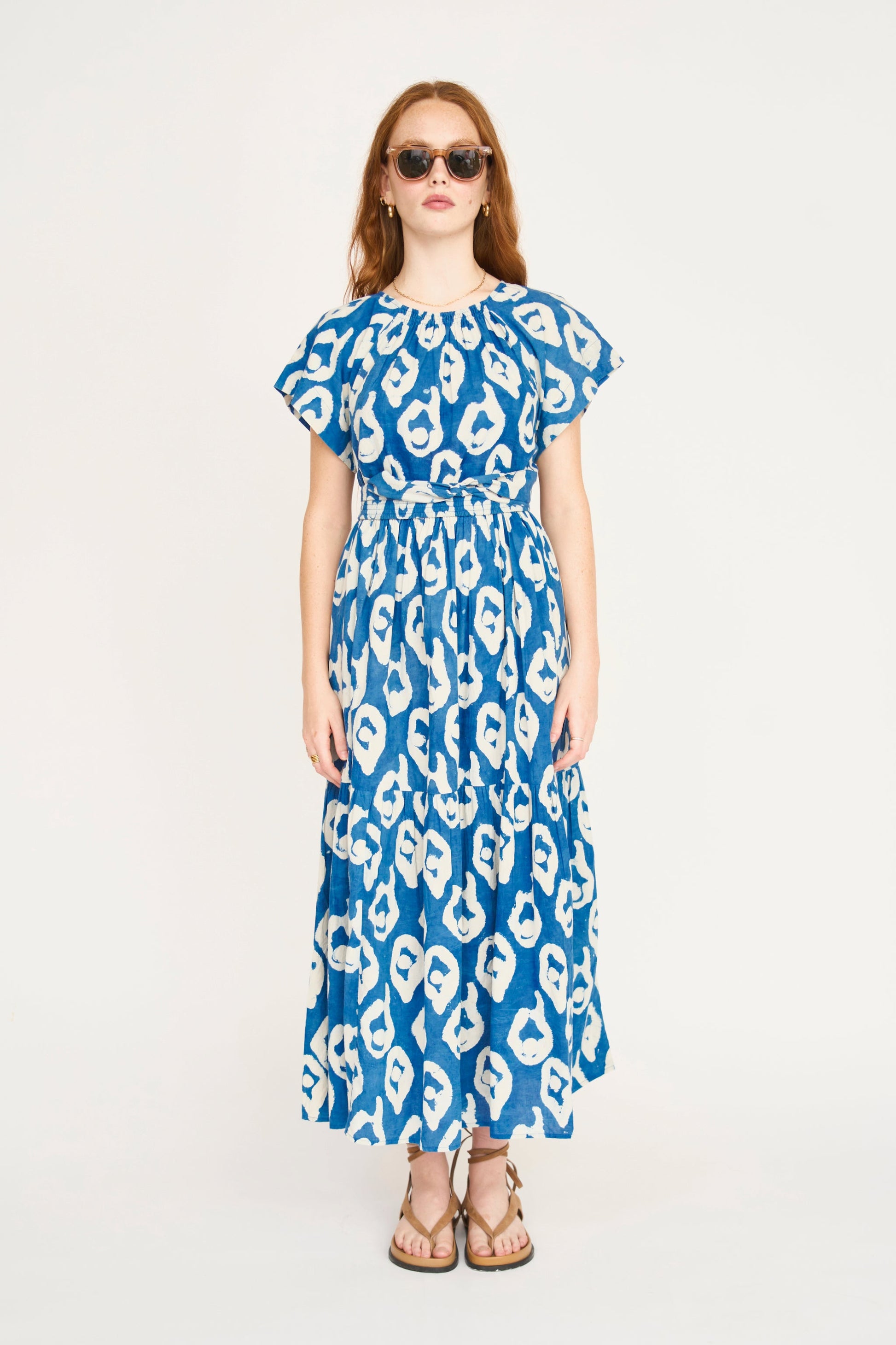 Indigo cotton maxi dress on a hanger in store