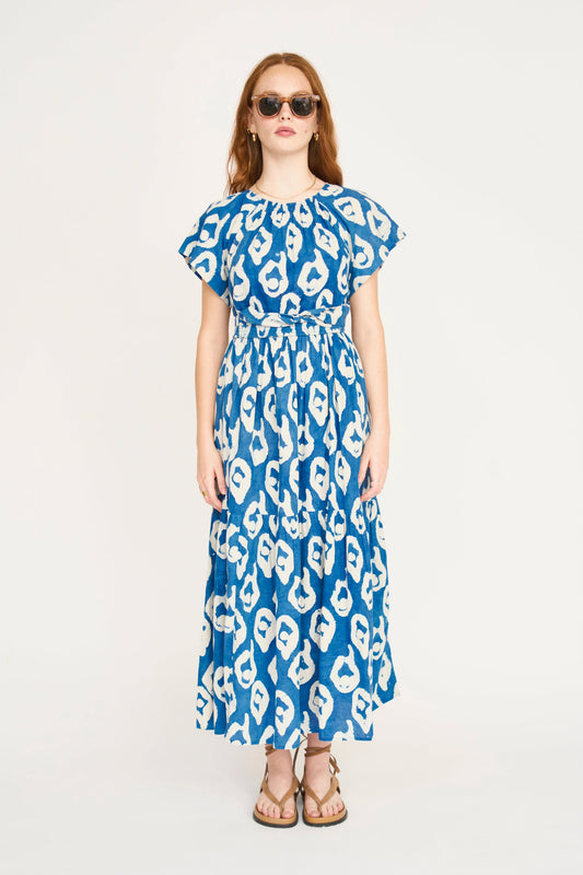 Indigo cotton maxi dress on a hanger in store