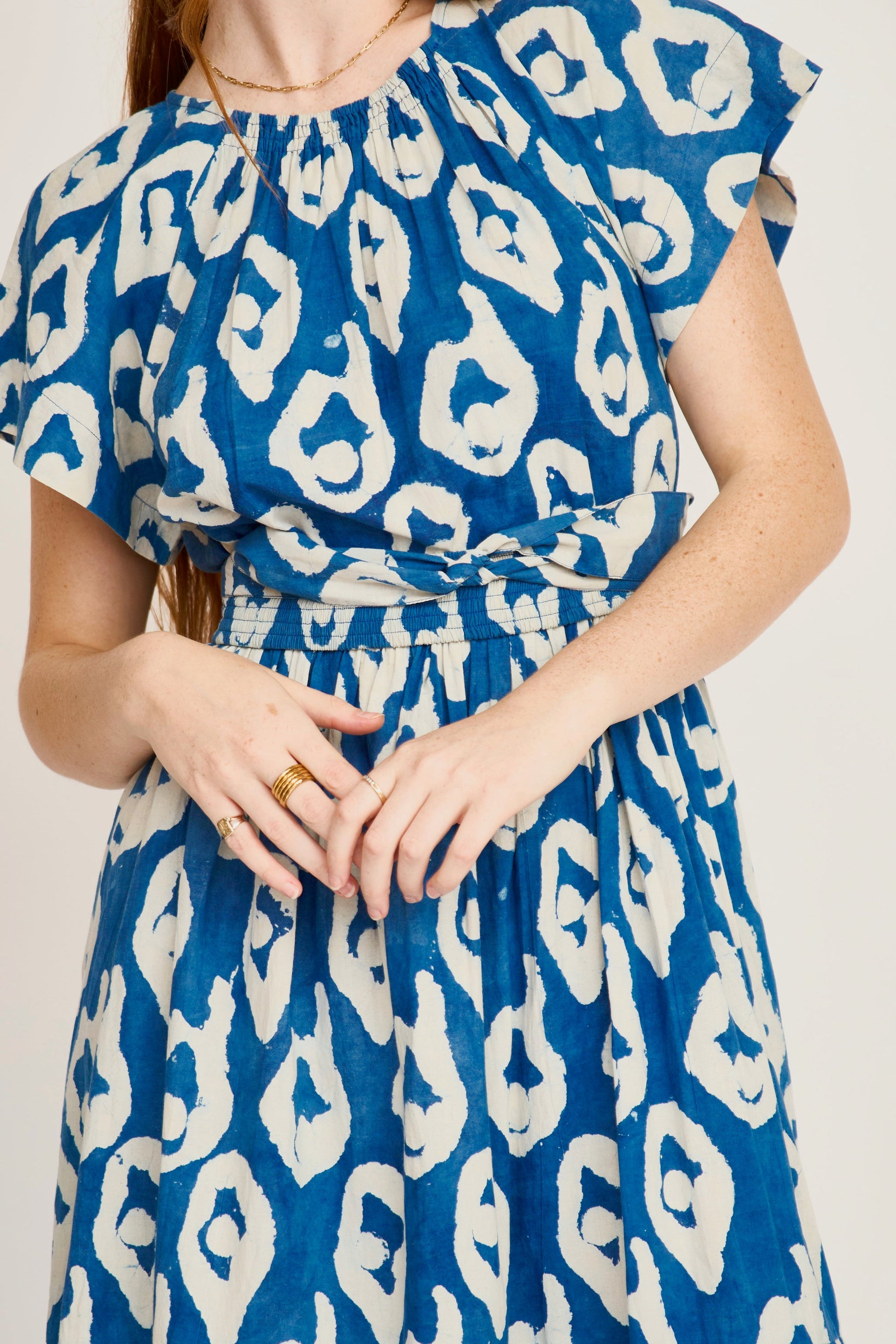 Indigo cotton maxi dress on a hanger in store