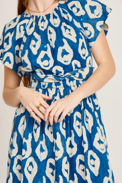 Indigo cotton maxi dress on a hanger in store