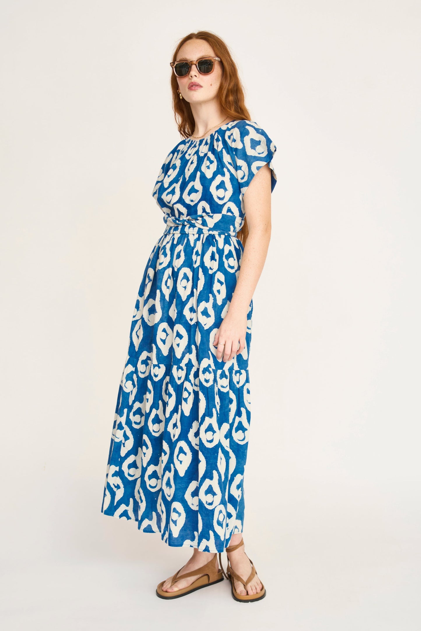 Indigo cotton maxi dress on a hanger in store