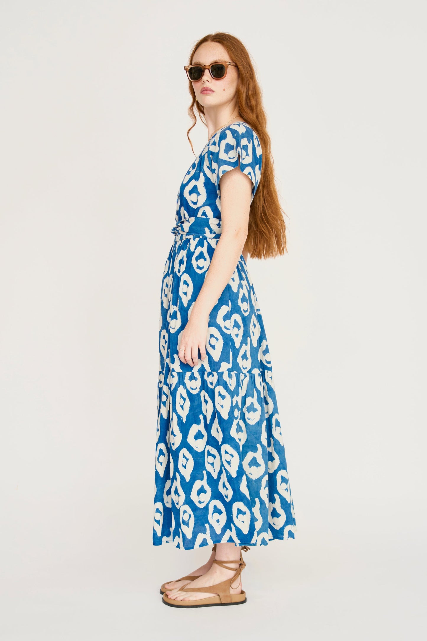 Indigo cotton maxi dress on a hanger in store