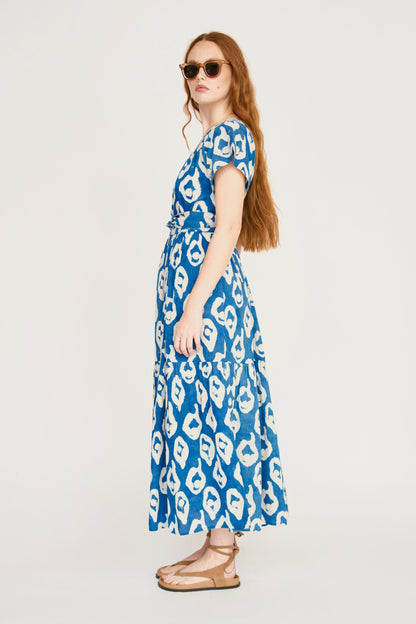 Indigo cotton maxi dress on a hanger in store