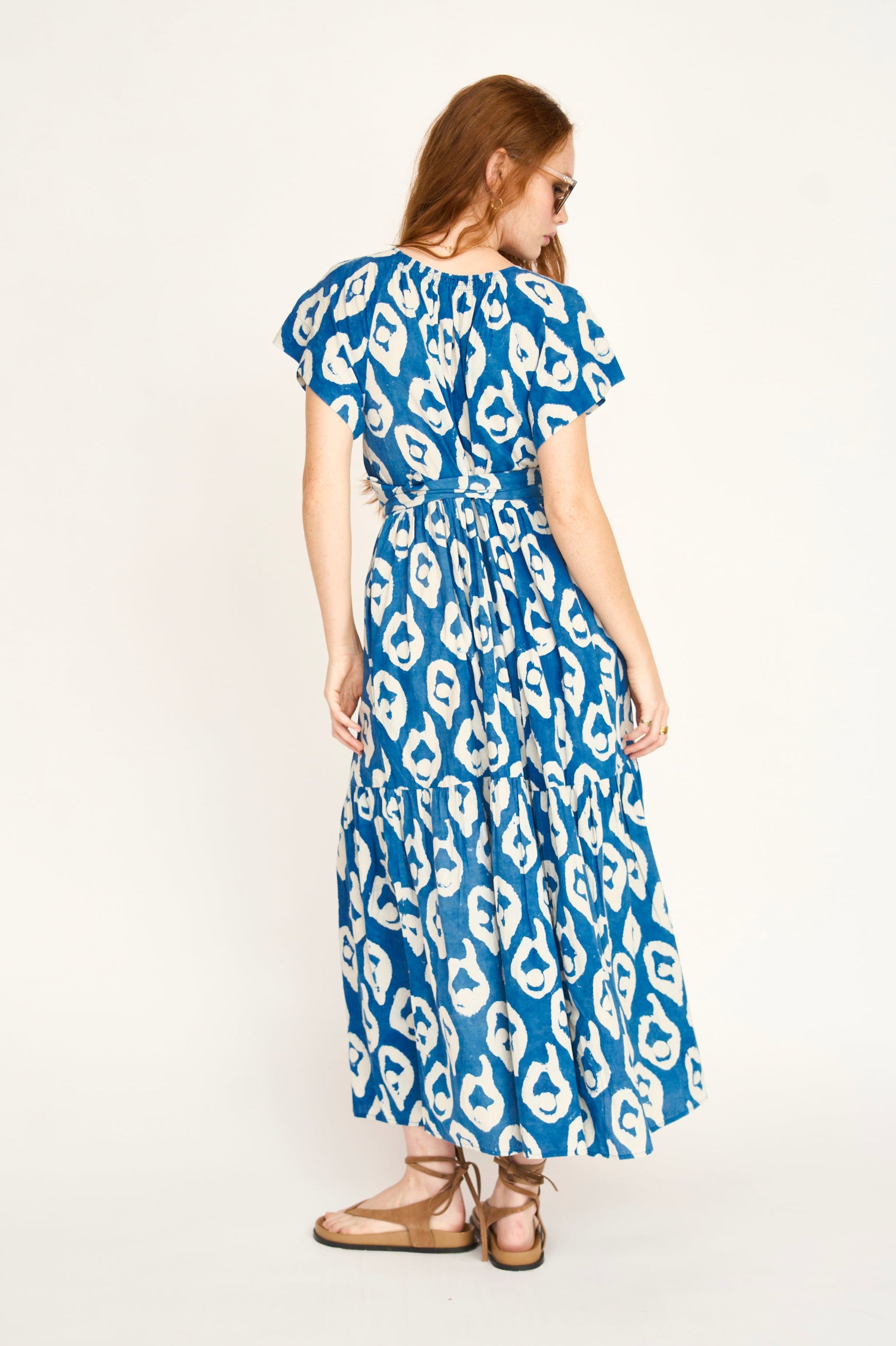 Indigo cotton maxi dress on a hanger in store