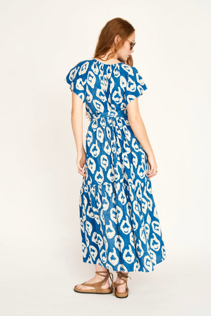 Indigo cotton maxi dress on a hanger in store