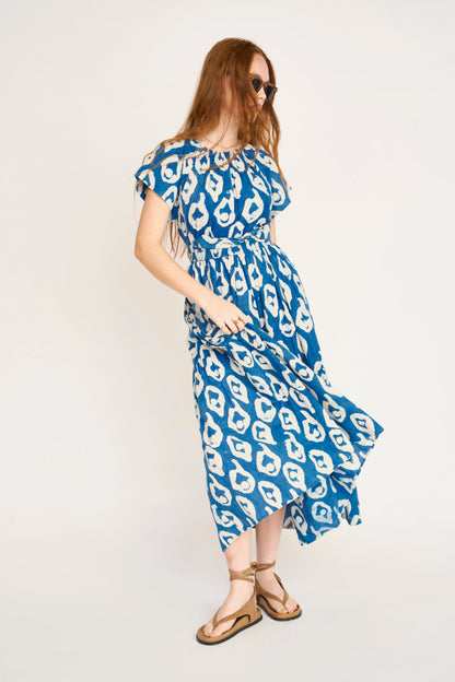 Indigo cotton maxi dress on a hanger in store